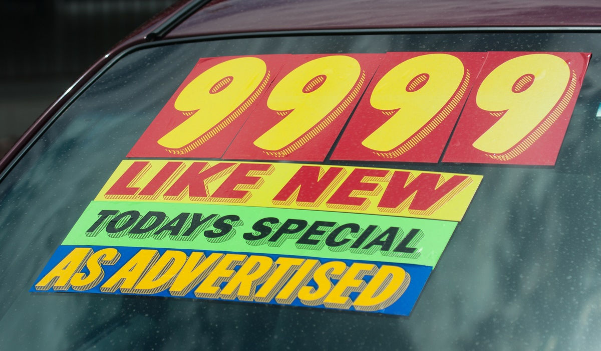 Used car windshield price sticker