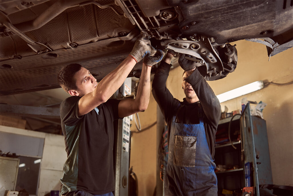 mechanics_checking_brakes