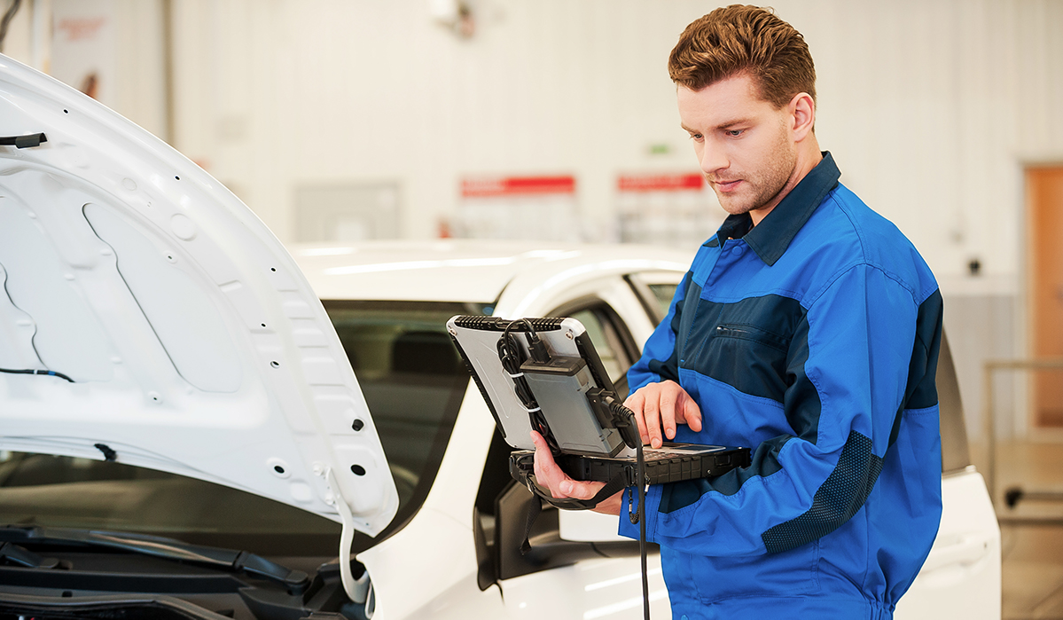 mechanic-examining-car