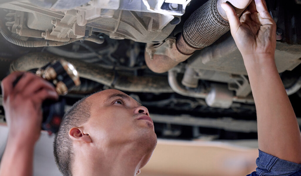 car-mechanic-in-garage-and-service-inspection