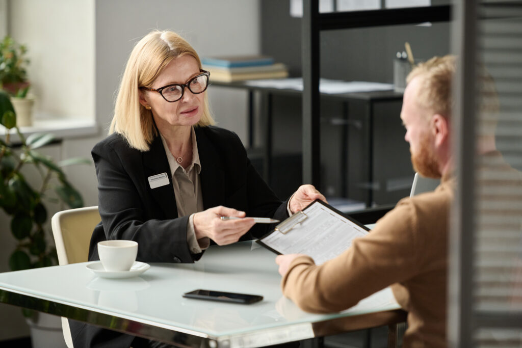 Female lawyer consulting person